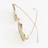 Osiris in Gold Titanium with Light Green Lenses